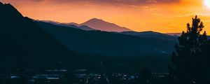 Preview wallpaper mountains, sunset, aerial view, village, clouds