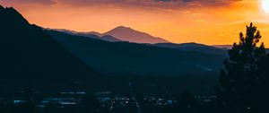 Preview wallpaper mountains, sunset, aerial view, village, clouds
