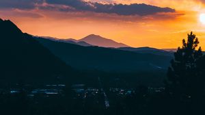 Preview wallpaper mountains, sunset, aerial view, village, clouds