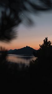 Preview wallpaper mountains, sunset, branches, blur, night