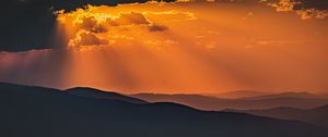 Preview wallpaper mountains, sunset, clouds, rays, dusk