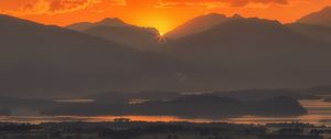 Preview wallpaper mountains, sunset, fog, scotland