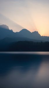 Preview wallpaper mountains, sunset, lake, light, sky, silence