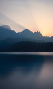 Preview wallpaper mountains, sunset, lake, light, sky, silence