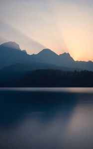 Preview wallpaper mountains, sunset, lake, light, sky, silence