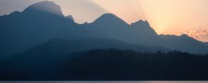 Preview wallpaper mountains, sunset, lake, light, sky, silence