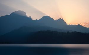 Preview wallpaper mountains, sunset, lake, light, sky, silence