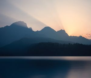 Preview wallpaper mountains, sunset, lake, light, sky, silence