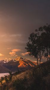 Preview wallpaper mountains, sunset, lake, grass, new zealand