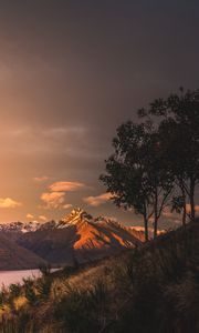 Preview wallpaper mountains, sunset, lake, grass, new zealand