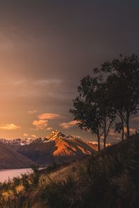 Preview wallpaper mountains, sunset, lake, grass, new zealand