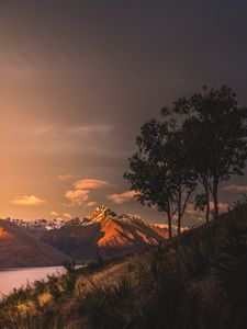 Preview wallpaper mountains, sunset, lake, grass, new zealand