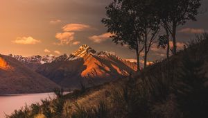 Preview wallpaper mountains, sunset, lake, grass, new zealand