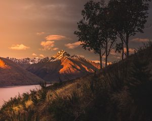 Preview wallpaper mountains, sunset, lake, grass, new zealand