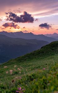 Preview wallpaper mountains, sunset, landscape, slopes, grass, flowers