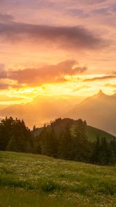 Preview wallpaper mountains, sunset, lawn, trees, landscape