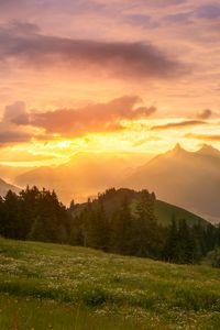 Preview wallpaper mountains, sunset, lawn, trees, landscape