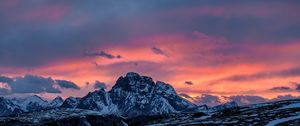 Preview wallpaper mountains, sunset, peaks, snowy, sky, clouds, italy