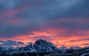 Preview wallpaper mountains, sunset, peaks, snowy, sky, clouds, italy