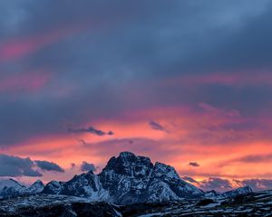 Preview wallpaper mountains, sunset, peaks, snowy, sky, clouds, italy