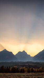 Preview wallpaper mountains, sunset, rays, landscape