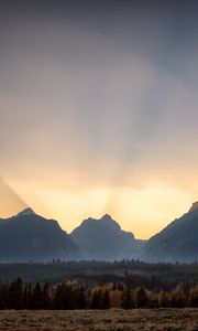 Preview wallpaper mountains, sunset, rays, landscape