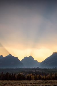 Preview wallpaper mountains, sunset, rays, landscape