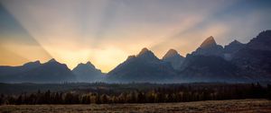 Preview wallpaper mountains, sunset, rays, landscape
