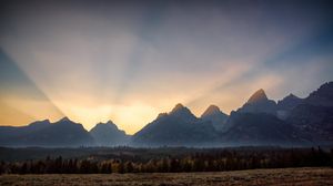 Preview wallpaper mountains, sunset, rays, landscape