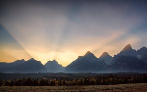 Preview wallpaper mountains, sunset, rays, landscape