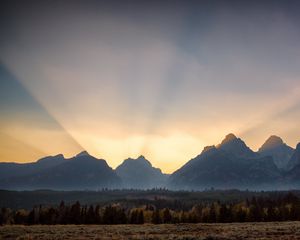Preview wallpaper mountains, sunset, rays, landscape