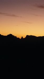 Preview wallpaper mountains, sunset, silhouette, outlines, dark