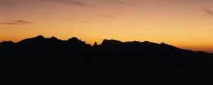 Preview wallpaper mountains, sunset, silhouette, outlines, dark