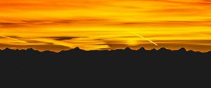 Preview wallpaper mountains, sunset, sky, dark, red, yellow, black