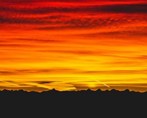 Preview wallpaper mountains, sunset, sky, dark, red, yellow, black