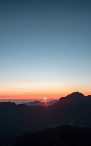 Preview wallpaper mountains, sunset, sky, peaks, aerial view