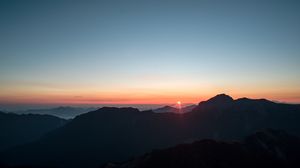 Preview wallpaper mountains, sunset, sky, peaks, aerial view
