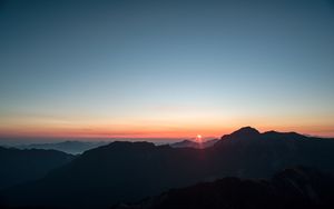 Preview wallpaper mountains, sunset, sky, peaks, aerial view