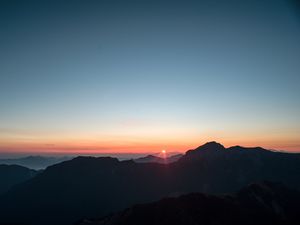 Preview wallpaper mountains, sunset, sky, peaks, aerial view