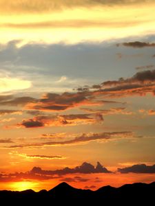 Preview wallpaper mountains, sunset, skyline, clouds, sky