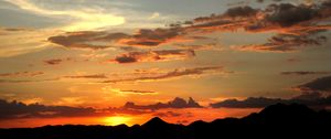 Preview wallpaper mountains, sunset, skyline, clouds, sky