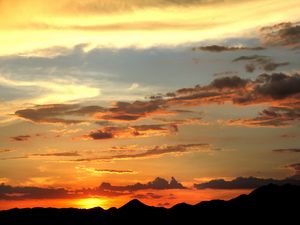 Preview wallpaper mountains, sunset, skyline, clouds, sky