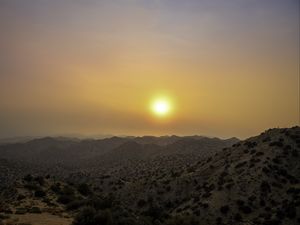 Preview wallpaper mountains, sunset, sun, dusk, evening, landscape
