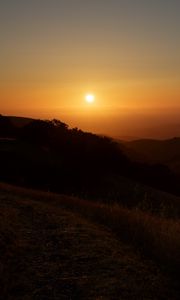Preview wallpaper mountains, sunset, sun, dusk, evening, dark