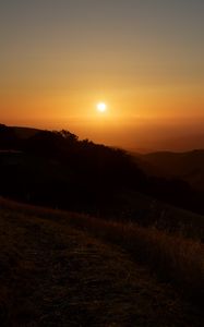 Preview wallpaper mountains, sunset, sun, dusk, evening, dark