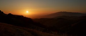 Preview wallpaper mountains, sunset, sun, dusk, evening, dark