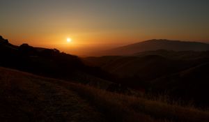 Preview wallpaper mountains, sunset, sun, dusk, evening, dark