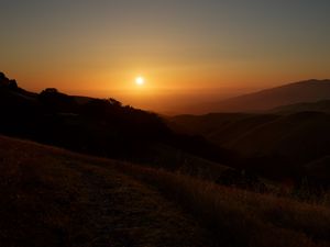 Preview wallpaper mountains, sunset, sun, dusk, evening, dark
