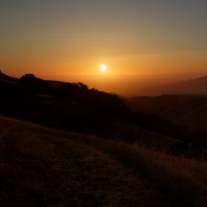 Preview wallpaper mountains, sunset, sun, dusk, evening, dark
