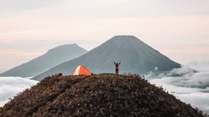 Preview wallpaper mountains, tent, person, camping, nature